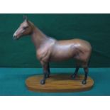 BESWICK UNGLAZED CERAMIC HORSE- ARKLE, ON WOODEN MOUNT,