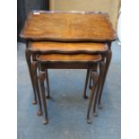 SHAPED TOPPED WALNUT NEST OF THREE TABLES