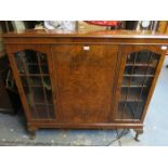 SIDE BY SIDE WALNUT AND MAHOGANY DISPLAY CABINET