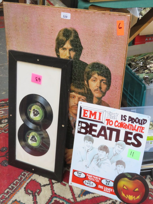 MOUNTED BEATLES JIGSAW, FRAMED CONTAINING TWO SINGLES,