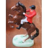 BESWICK GLAZED CERAMIC FIGURE OF A HUNTSMAN ON A REARING HORSE, No 868,