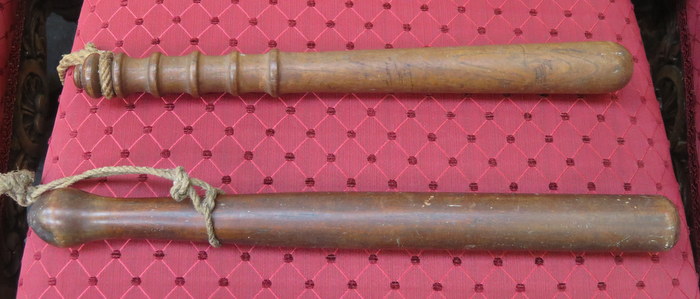 TWO VINTAGE TREEN POLICE TRUNCHEONS