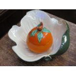 CLARICE CLIFF BIZARRE CERAMIC STORAGE POT AND COVER PLUS CARLTONWARE LEAF DISH