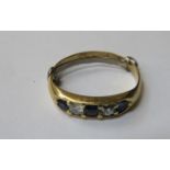 GOLD DRESS RING SET WITH TWO CLEAR STONES AND THREE SAPPHIRES