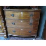 BOW FRONTED MAHOGANY TWO OVER THREE CHEST OF DRAWERS