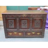 HEAVILY CARVED ANTIQUE OAK COFFER WITH SMALL SECRET DRAWER TO INSIDE