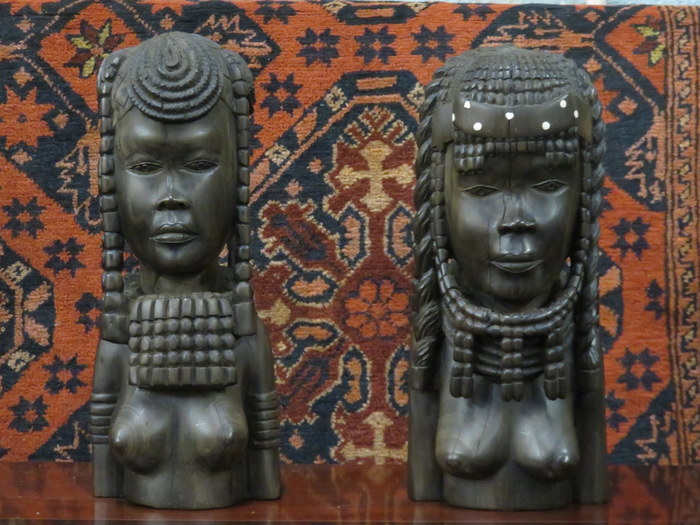 PAIR OF HEAVILY CARVED ANGOLAN BUSTS