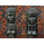 PAIR OF HEAVILY CARVED ANGOLAN BUSTS