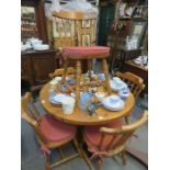 PINE CIRCULAR DINING TABLE AND FOUR CHAIRS