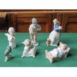 THREE NAO GLAZED CERAMIC FIGURES,