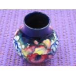 MOORCROFT FLORAL DECORATED CERAMIC VASE,