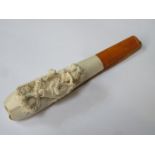 HEAVILY CARVED RELIEF DECORATED AUSTRIAN/SWISS CIGAR HOLDER WITH AMBER MOUTH PIECE