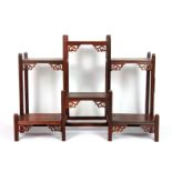 A pretty Chinese carved hardwood display stand, W. 33cm, H. 25cm.