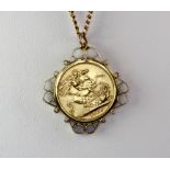 A 9ct gold mounted 1968 Elizabeth II gold sovereign on a 9ct gold (stamped 9ct) chain (overall