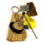 A quantity of mixed tribal bead work and other items, former missionary items including a paper