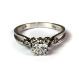 An 18ct white gold (stamped .750) ring set with a 0.85ct brilliant cut solitaire diamond (P.5).