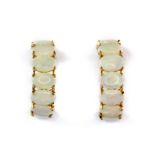 A pair of 14ct yellow gold (stamped 585) opal set earrings, L. 2cm.