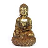 A Chinese gilt cast iron figure of a seated Buddha, H. 33cm.