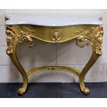 A marble topped gilt wood and ghesso decorated console table, W. 100cm, H. 80cm.