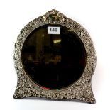A hallmarked silver velvet lined easel dressing table mirror, with pierced decoration, Henry