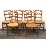 A set of six French rush seat chairs.