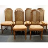 A set of six oak cane backed dining chairs.