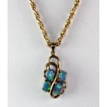 A 14ct yellow gold (stamped 14k) blue opal set necklace (approx. 9.7gr).