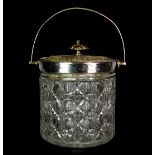 A 1920's silver plate and cut glass biscuit barrel, W. 20cm, H. 15cm.