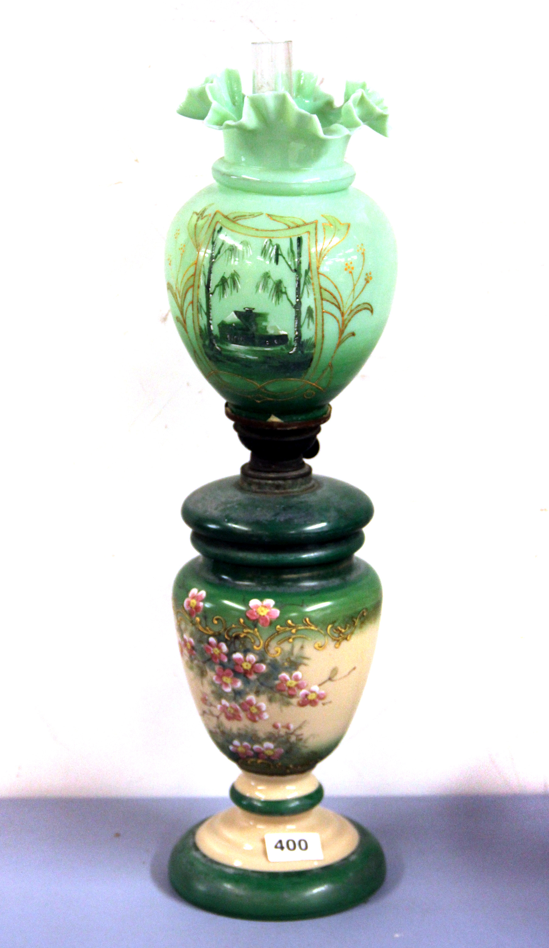 A 19th century hand painted opaline glass oil lamp and shade, H. 57cm.