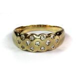 A yellow metal (tested 9ct gold) stone set ring (P).