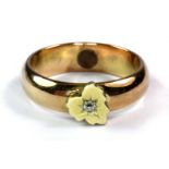 A heavy yellow metal (tested 18ct gold) diamond set ring (approx. 7.9gr) (R).