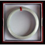 A fine Chinese jade bangle with certificate.