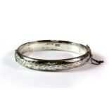 A hallmarked silver bangle, c. 1978, L. 6.5cm.