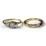 Two 9ct yellow gold diamond set rings (L.5 & N.5)