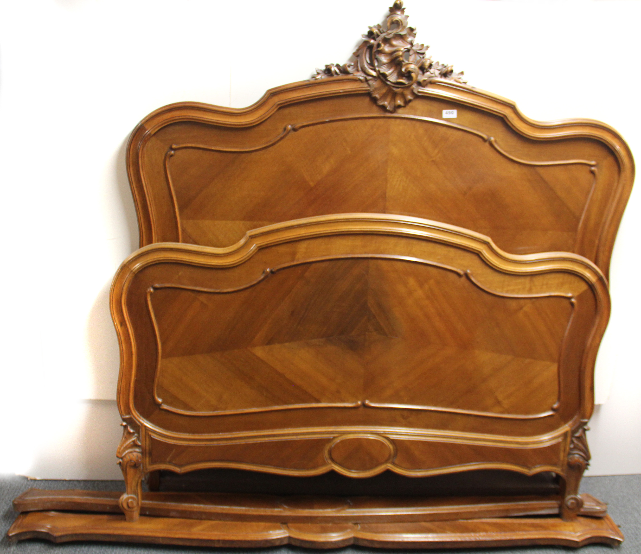 A 19th century French walnut double bed, W. 145cm.