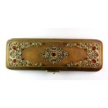 A 19thC Austrian leather expandable glove case, with applied and enamelled gilt metal and jewel like