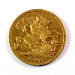 A Victorian half sovereign, dated 1900.