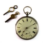 A hallmarked silver key wind pocket watch, with two keys.