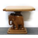A vintage carved teak elephant table, 53 x 43 x 49cm.