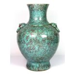 A lovely 19th century Chinese porcelain vase with lion ring handles and mottled red and turquoise