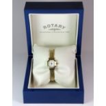 A boxed lady's Rotary gold plated wristwatch on an expanding strap.