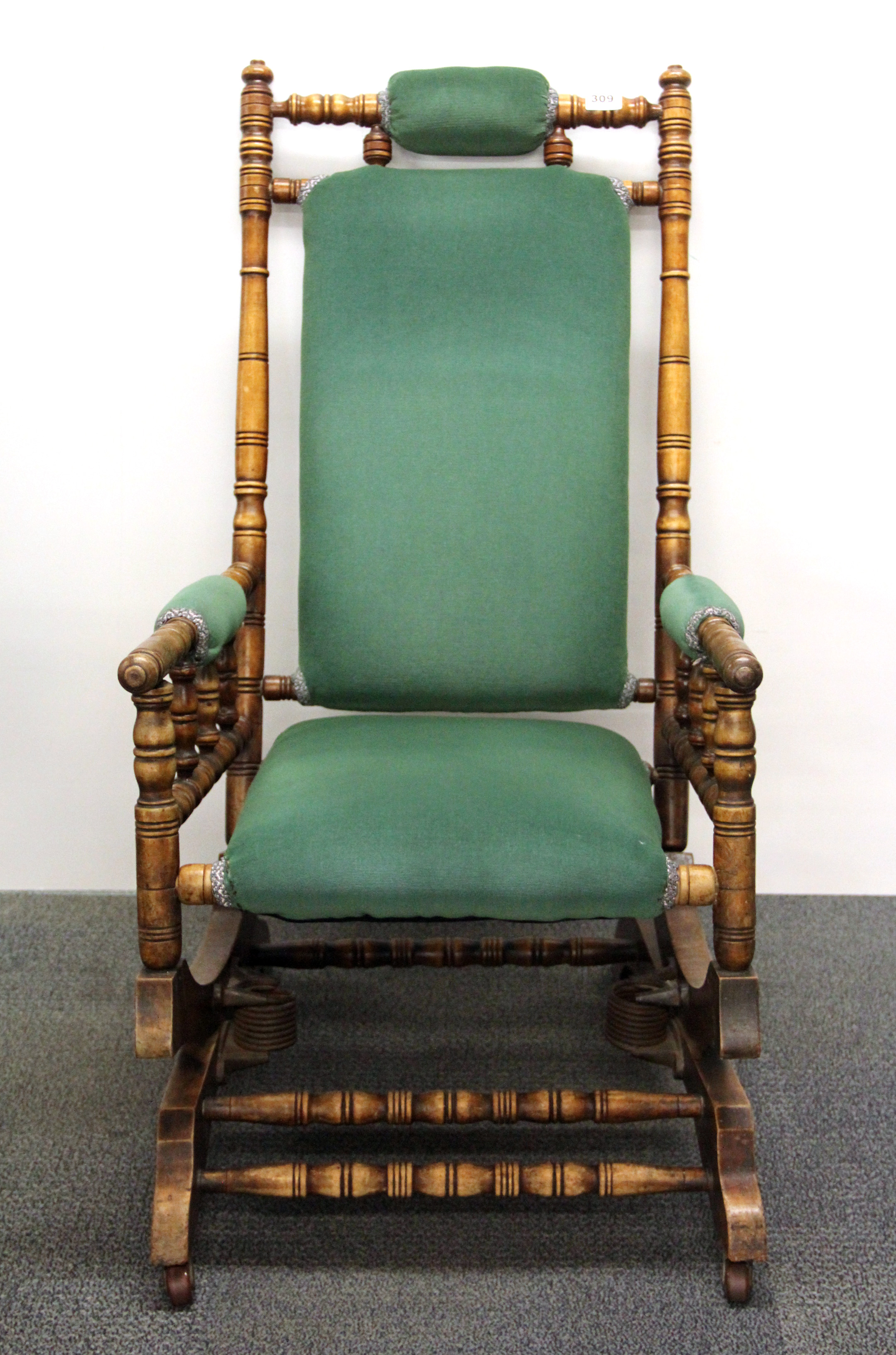 A 19th century American style rocking chair.