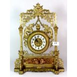 A superb 19th century Orientalist gilt brass mantle clock decorated with dragons, H. 41cm.