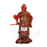 A reconstituted amber figure of a Chinese Emperor, H. 24cm.