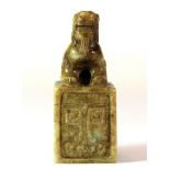 A Chinese jade / hardstone seal mounted with lion, H. 7.4cm.