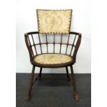 A lovely Arts & Crafts bow backed arm chair stamped initial GW to reverse, possibly from the