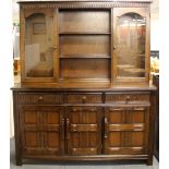 An oak display cabinet, W. 150cm H. 177cm D. 46cm.