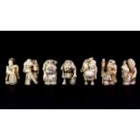 A set of seven early 20th century carved ivory figures of the Lucky Gods of Japan, H. 4cm.