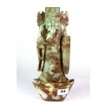 A Chinese carved jade figure of a lucky character, H. 30cm.