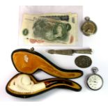 A bag of interesting items to include a white metal small dagger, bank notes, a cased Meerschaum